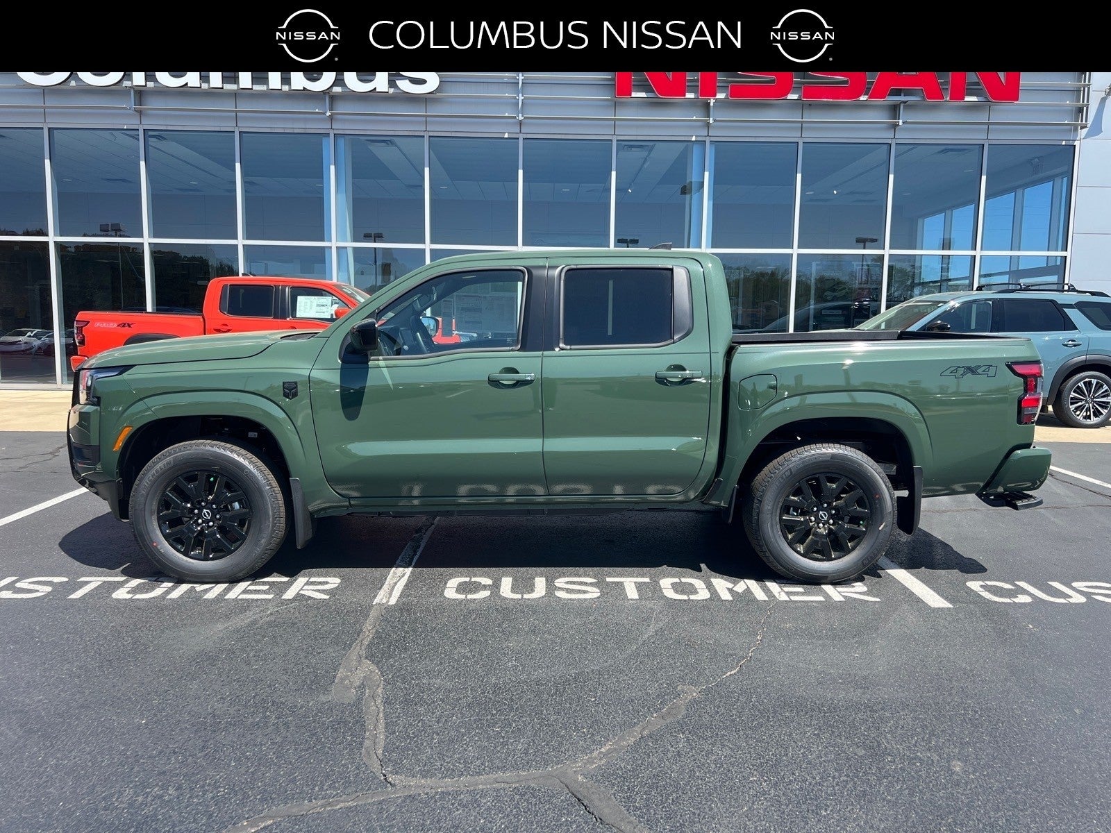 2026 Nissan Frontier SV in Green — front three-quarter view