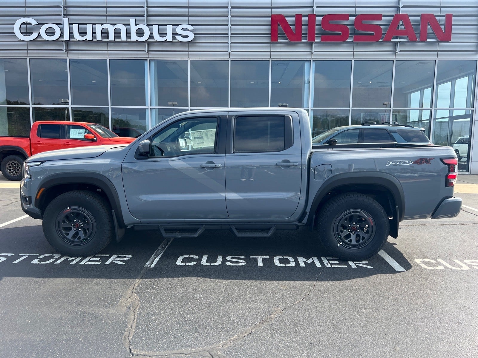 2026 Nissan Frontier PRO-4X in Gray — front three-quarter view