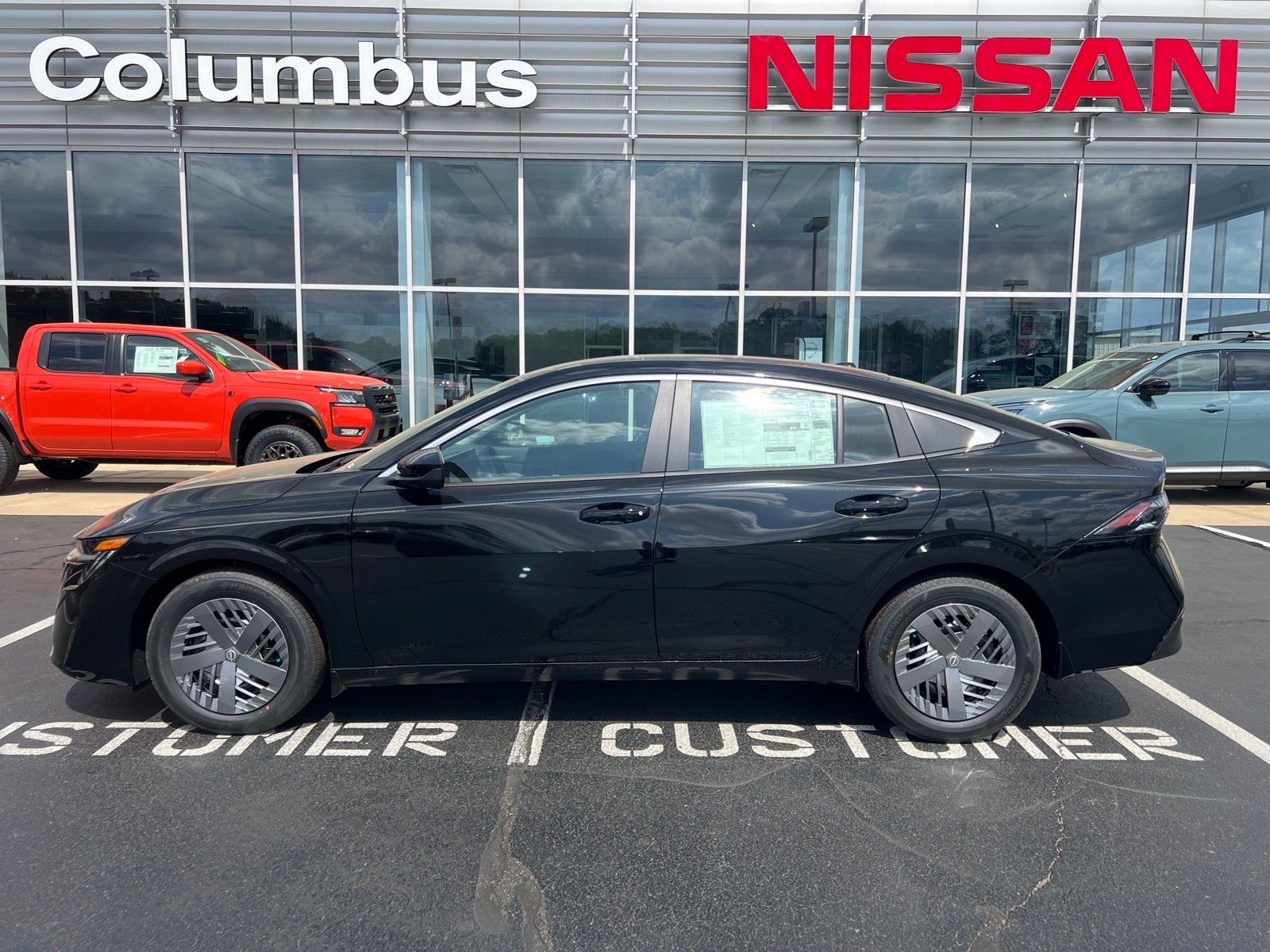 2026 Nissan Sentra SV in Black — front three-quarter view