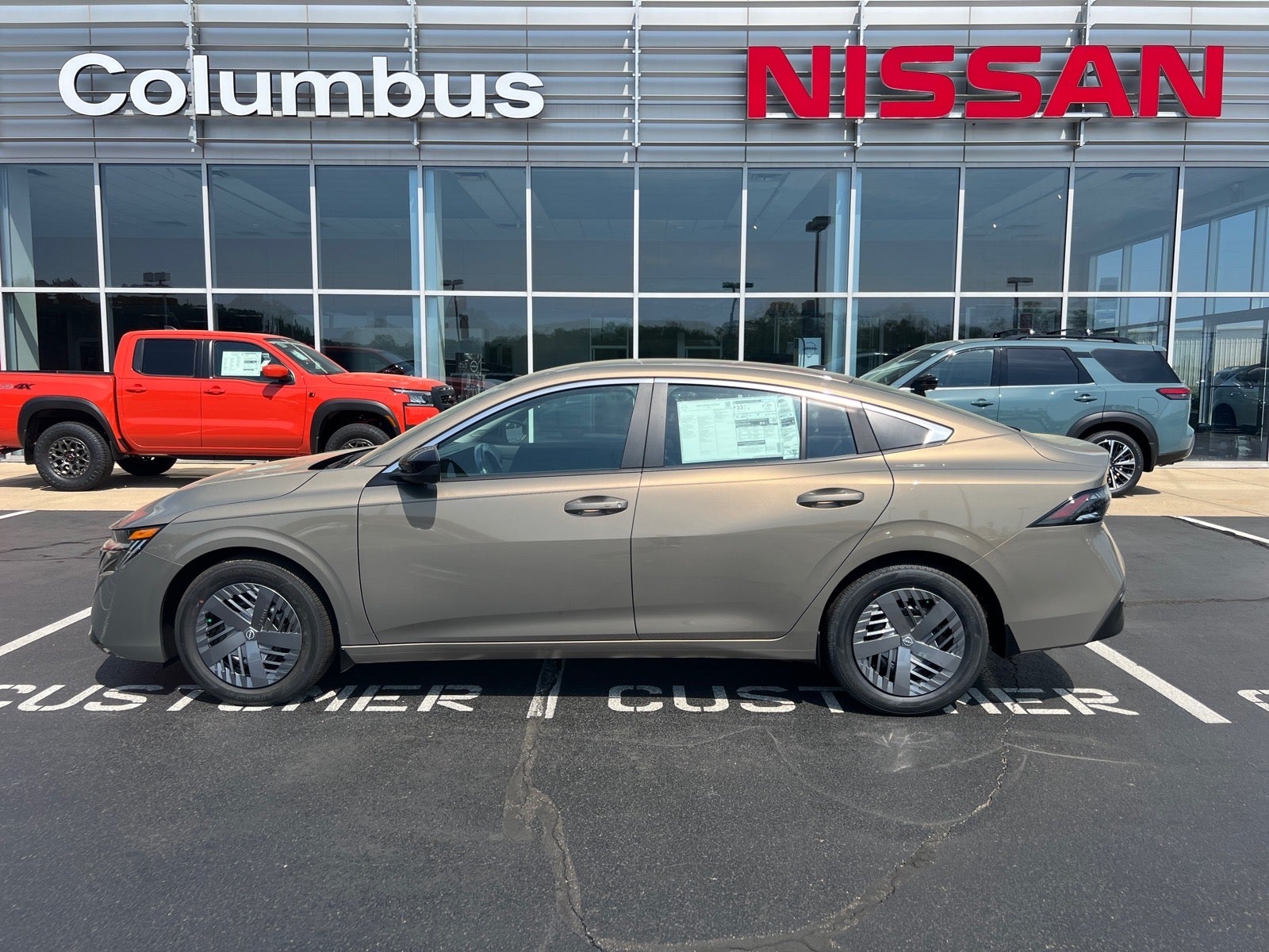 2026 Nissan Sentra SV in Bronze — front three-quarter view