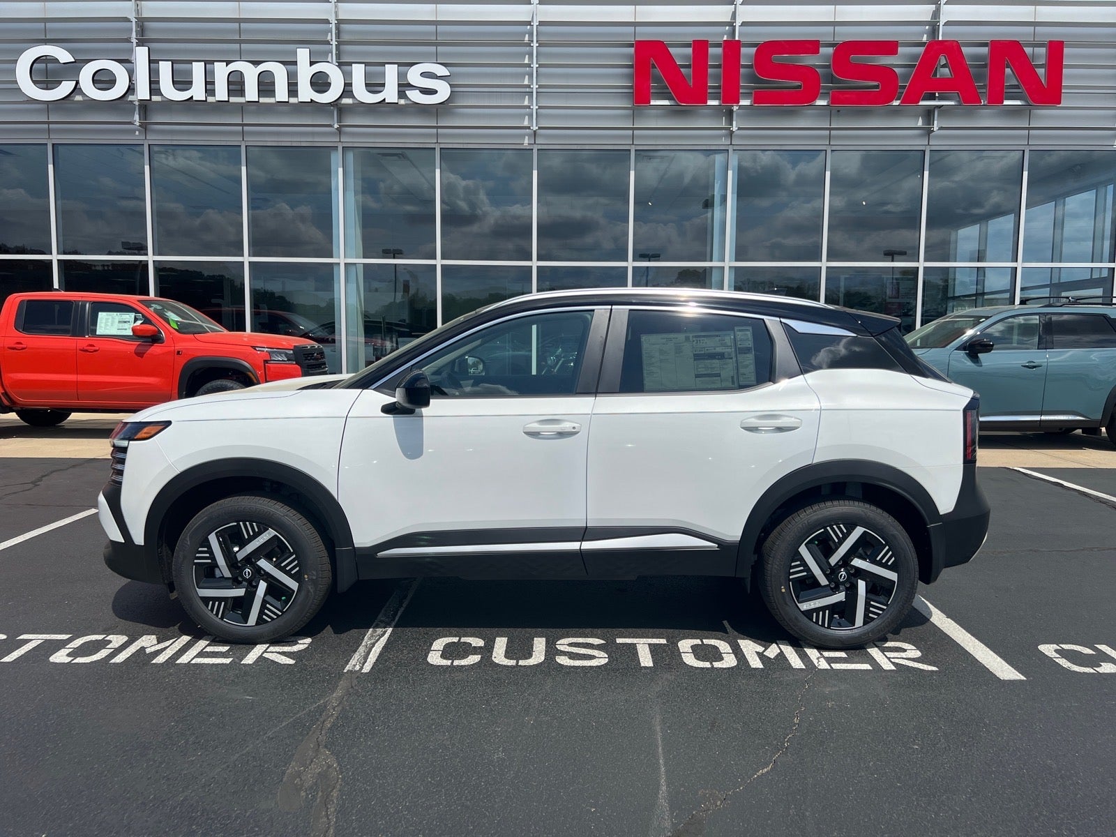 2026 Nissan Kicks SV in White — front three-quarter view
