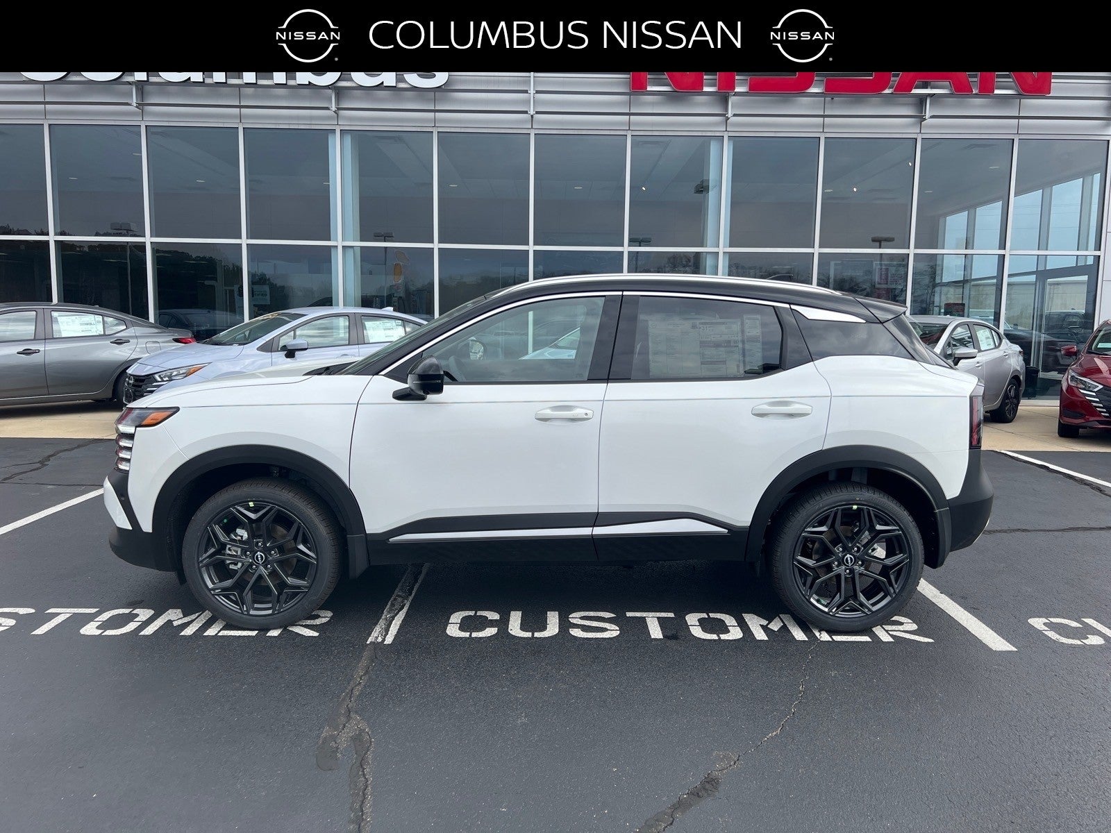 2026 Nissan Kicks SR in White — front three-quarter view