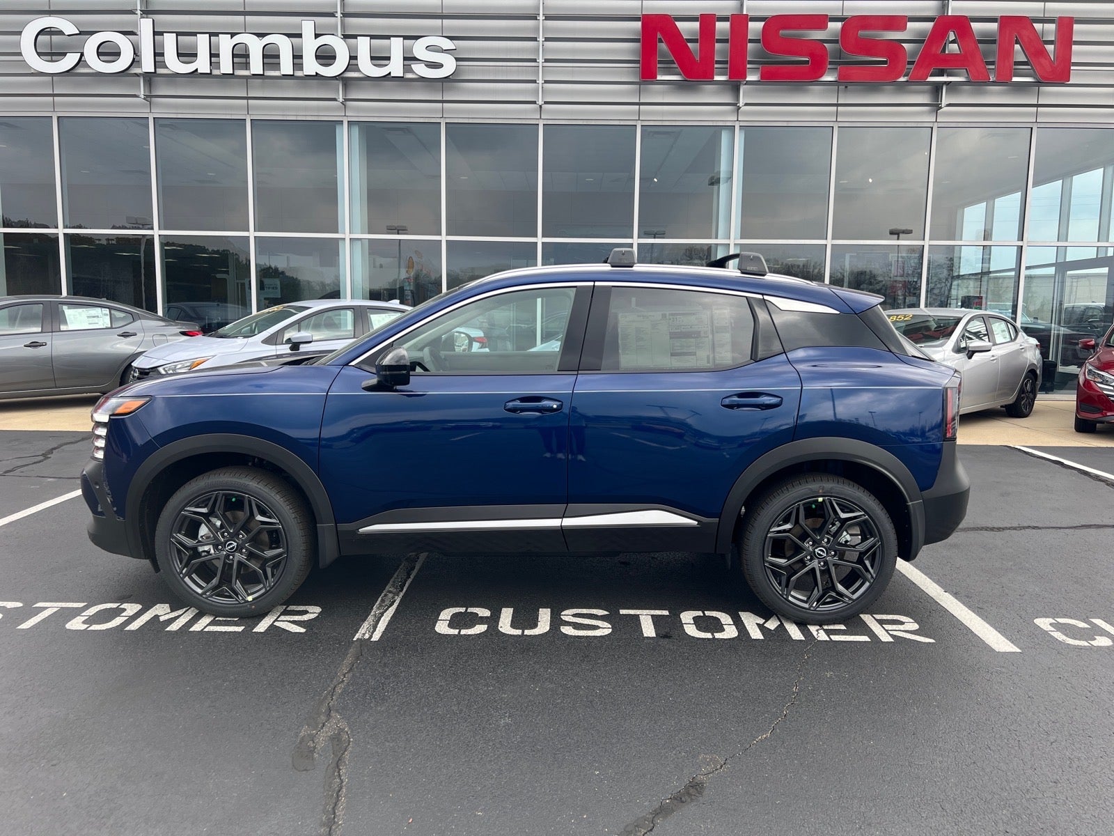 2026 Nissan Kicks SR in Blue — front three-quarter view
