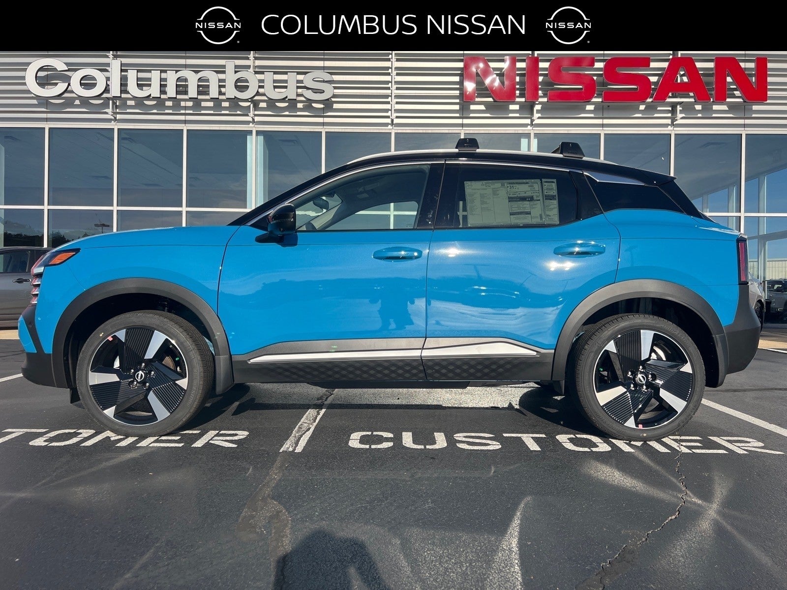 2026 Nissan Kicks SR in Blue — front three-quarter view