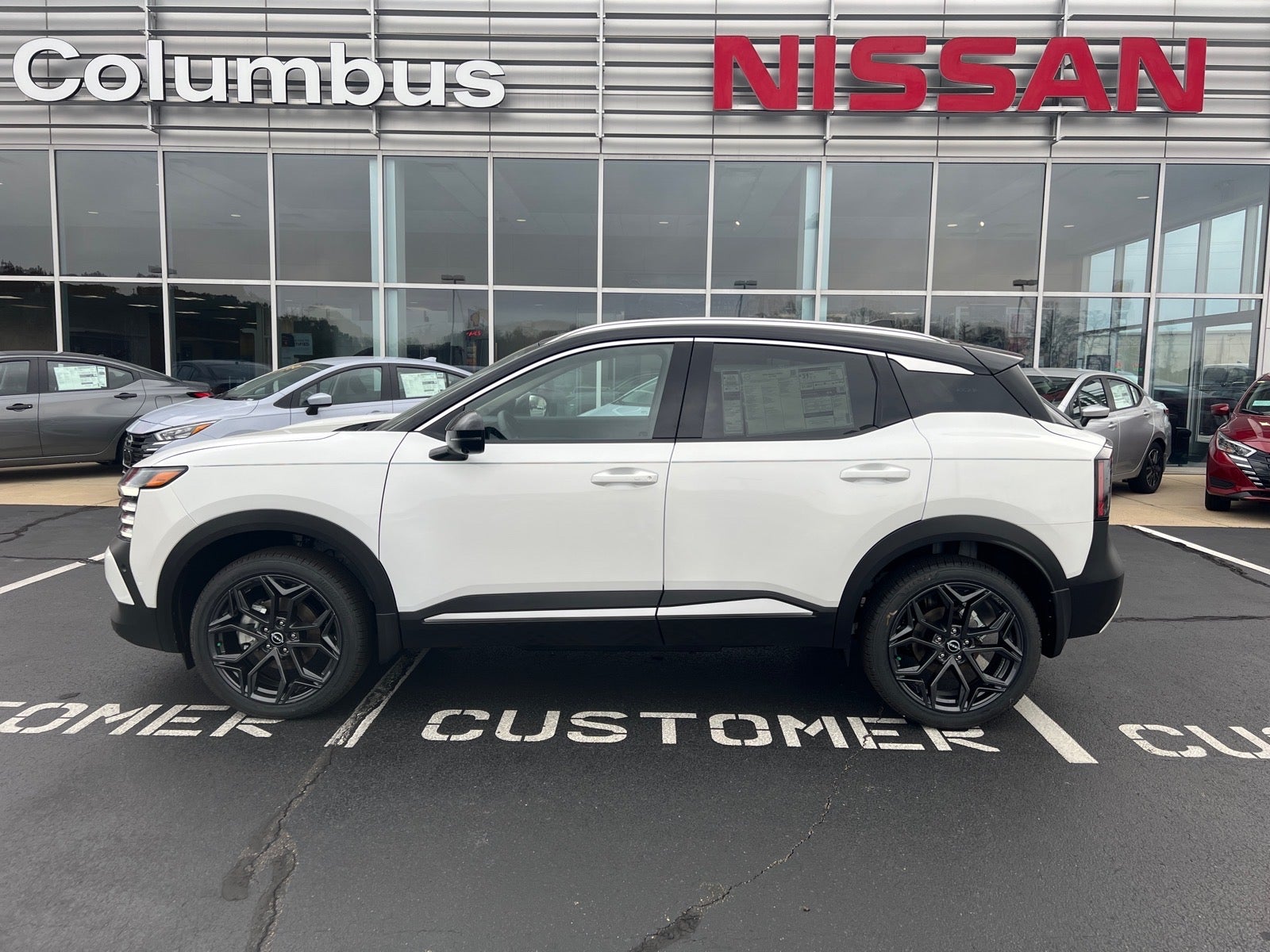 2026 Nissan Kicks SR in White — front three-quarter view