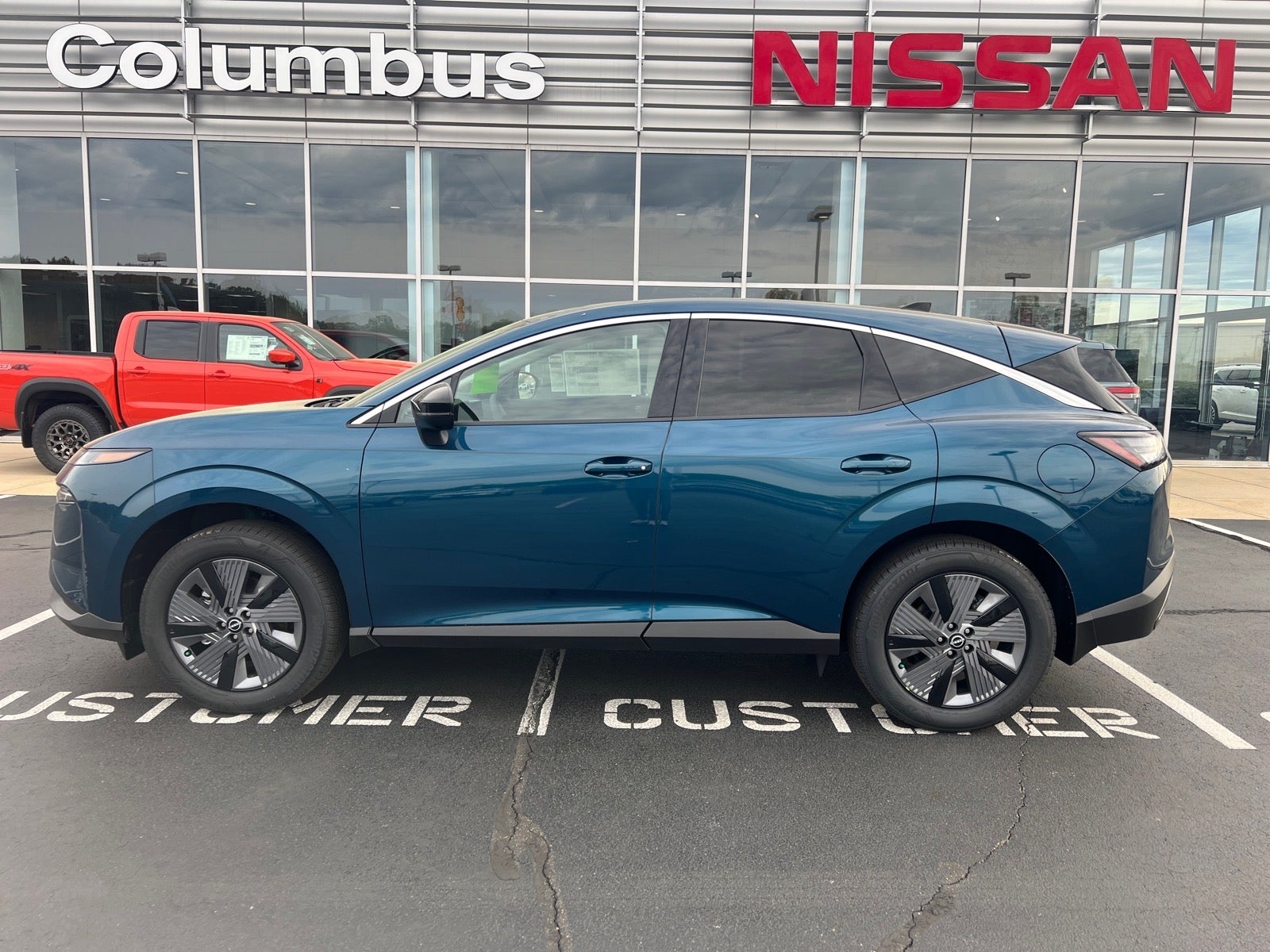 2026 Nissan Murano SL in Blue — front three-quarter view