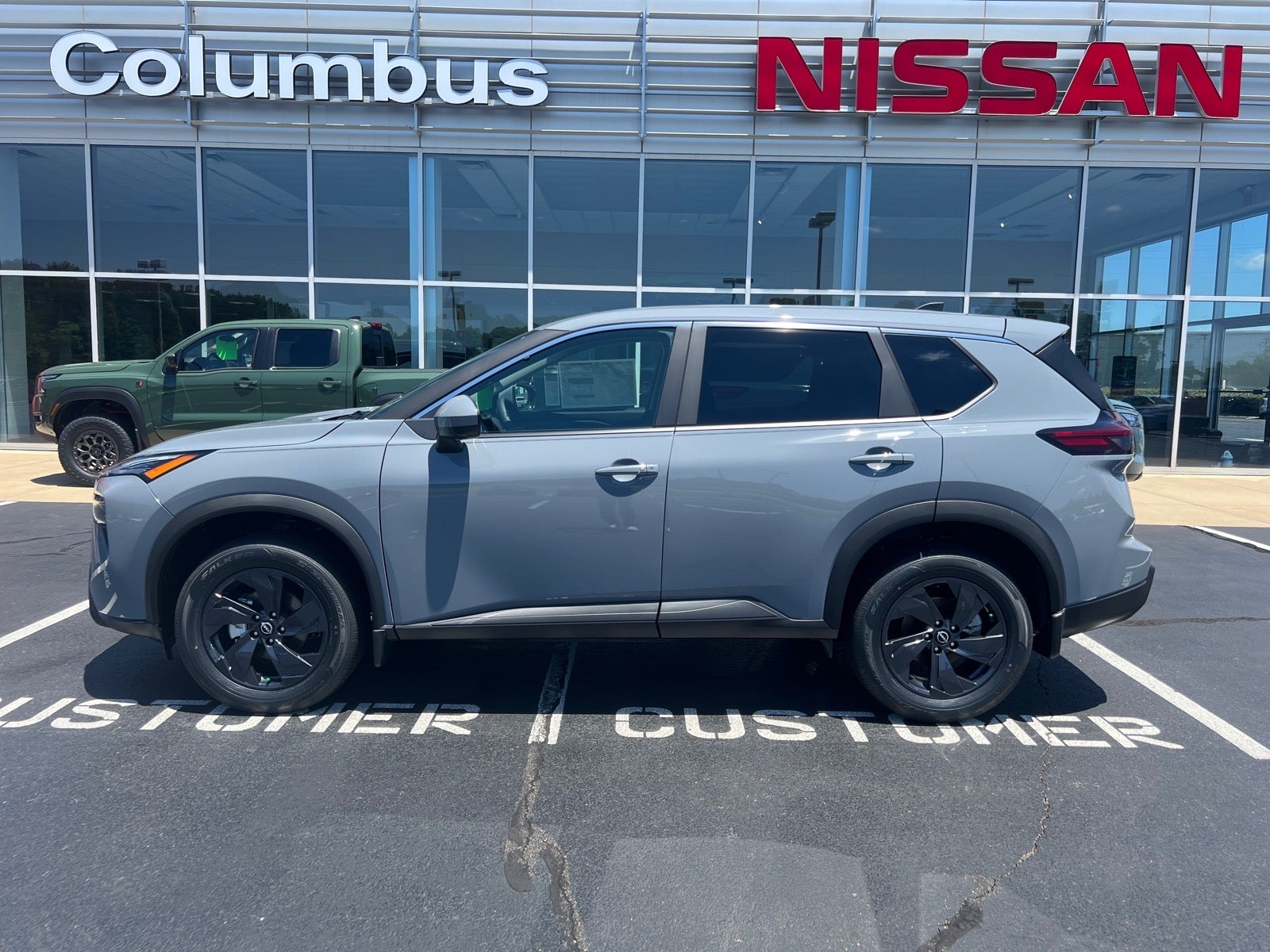 2026 Nissan Rogue SV in Gray — front three-quarter view