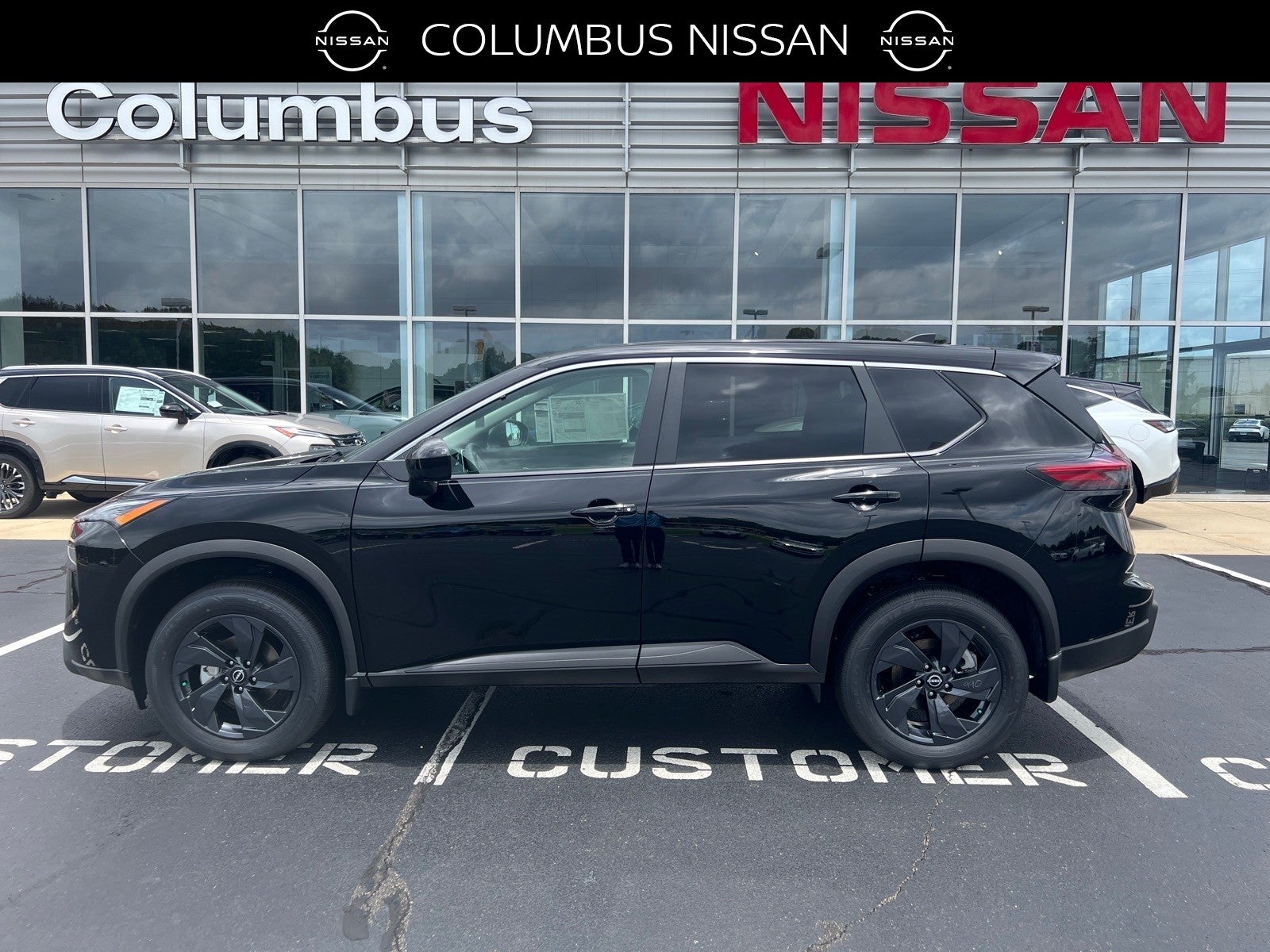 2026 Nissan Rogue SV in Black — front three-quarter view