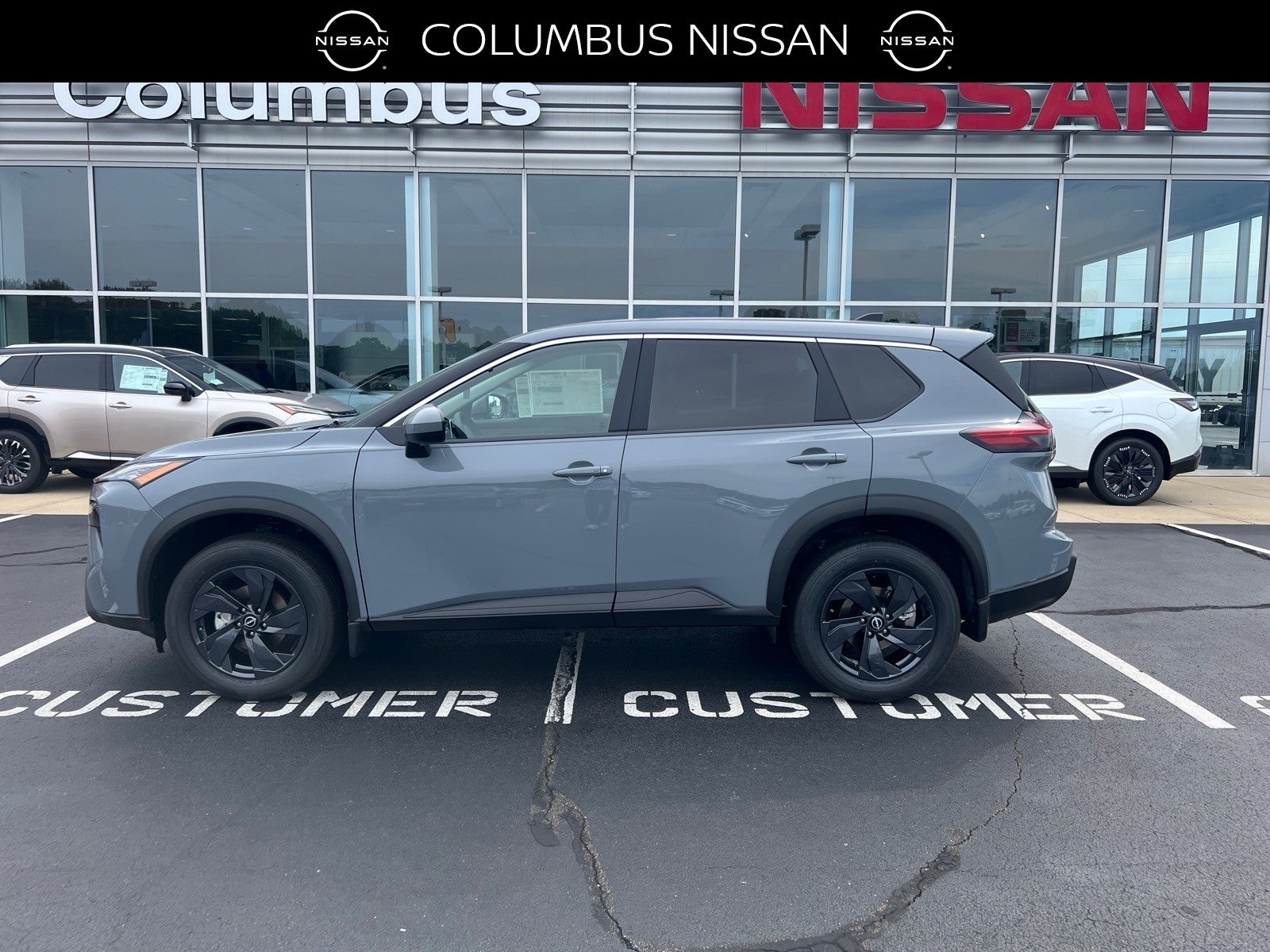 2026 Nissan Rogue SV in Gray — front three-quarter view