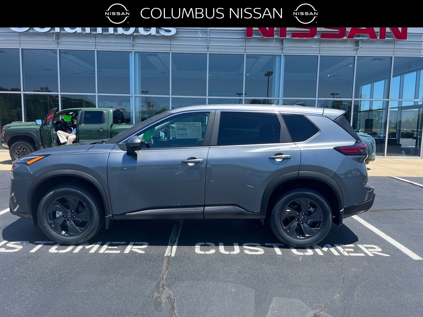 2026 Nissan Rogue SV in Gray — front three-quarter view