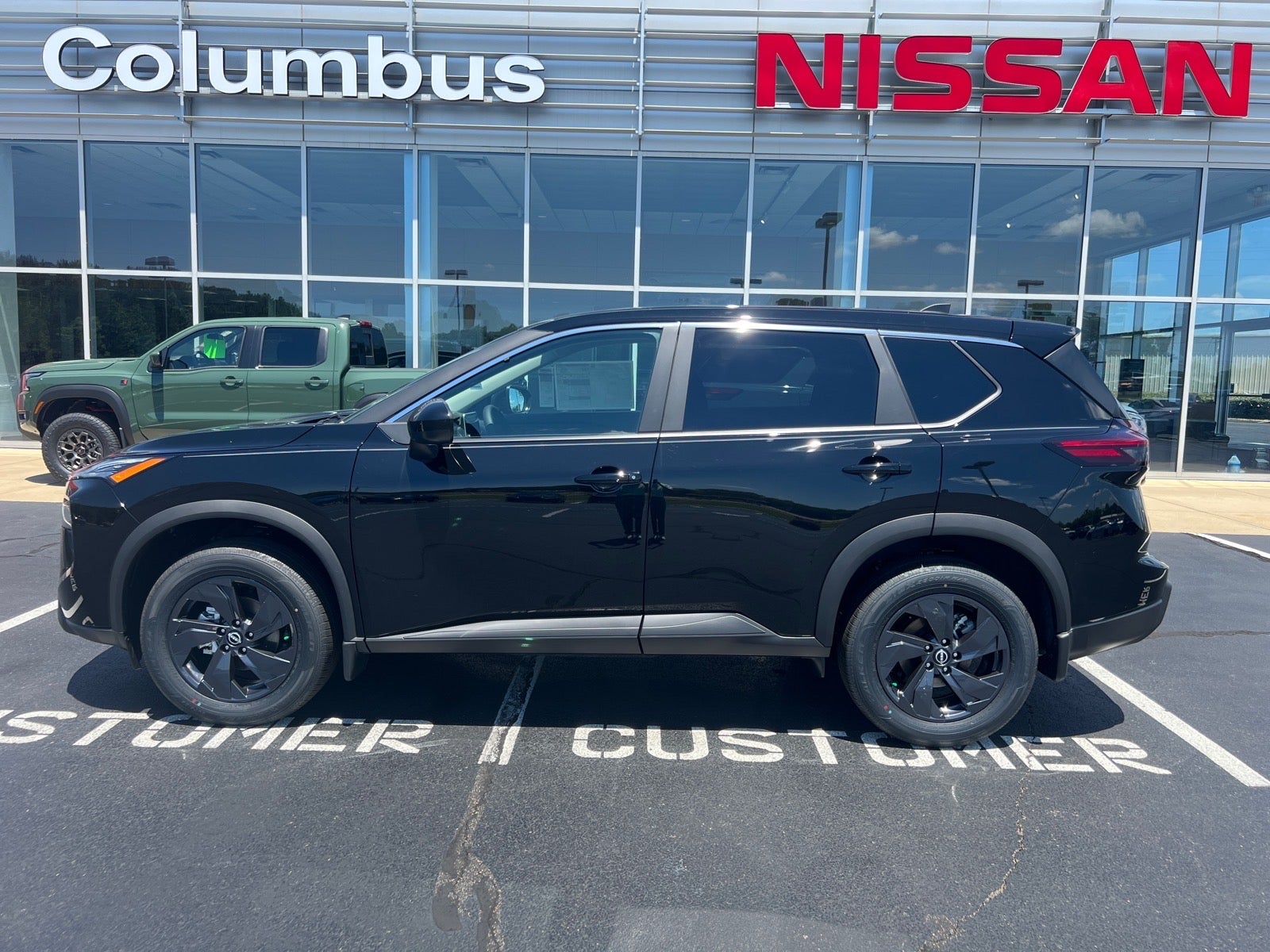2026 Nissan Rogue SV in Black — front three-quarter view