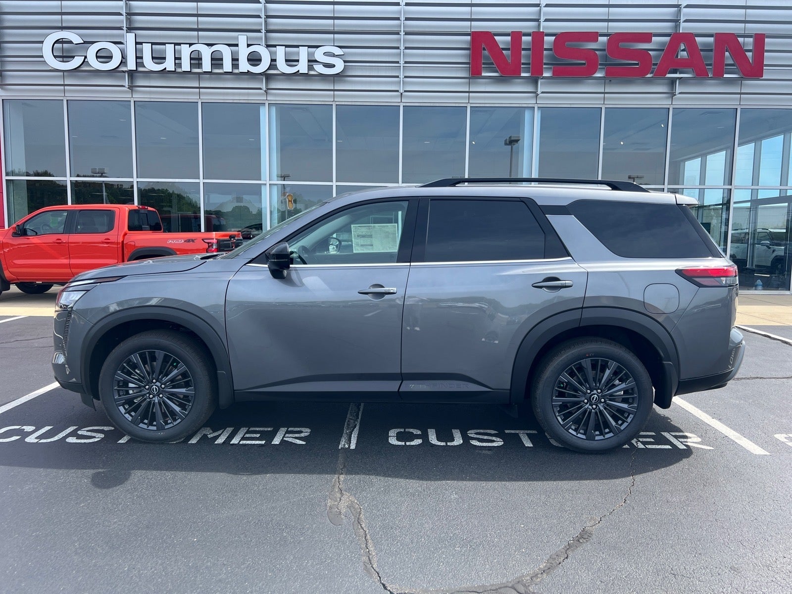 2026 Nissan Pathfinder SL in Gray — front three-quarter view
