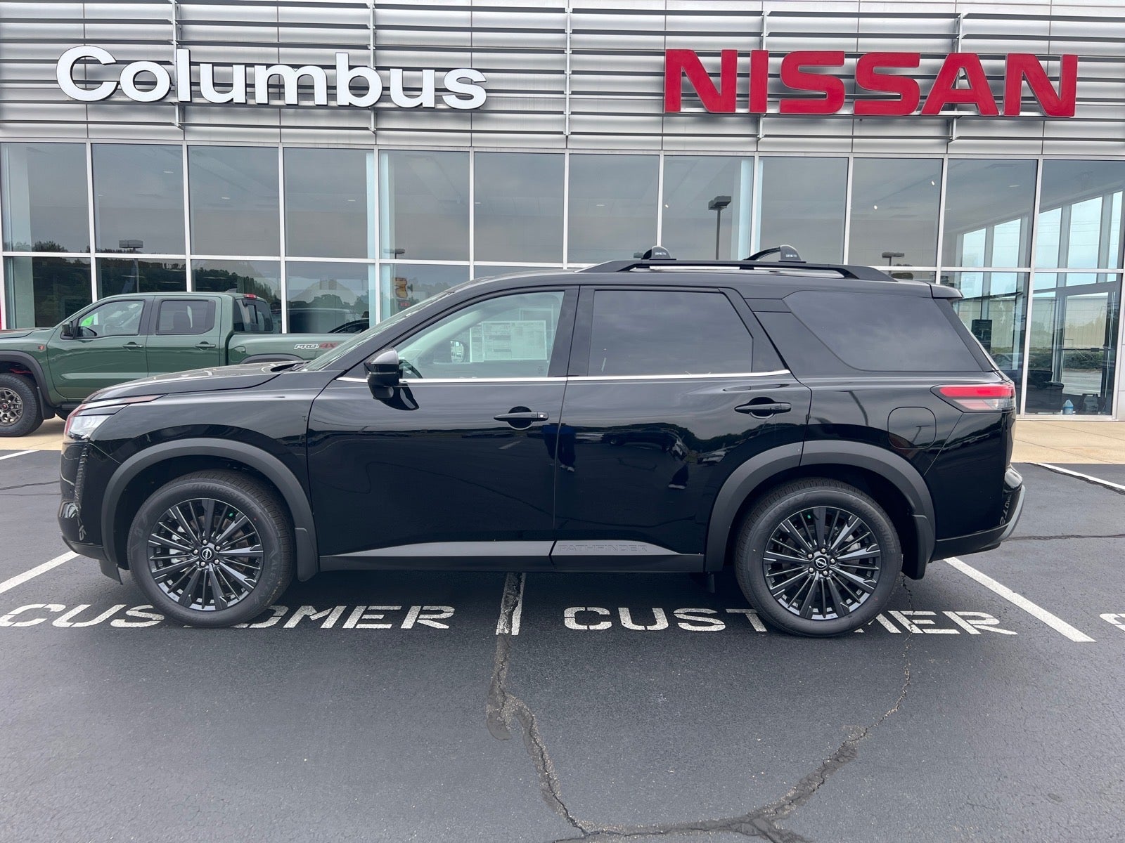 2026 Nissan Pathfinder SL in Black — front three-quarter view