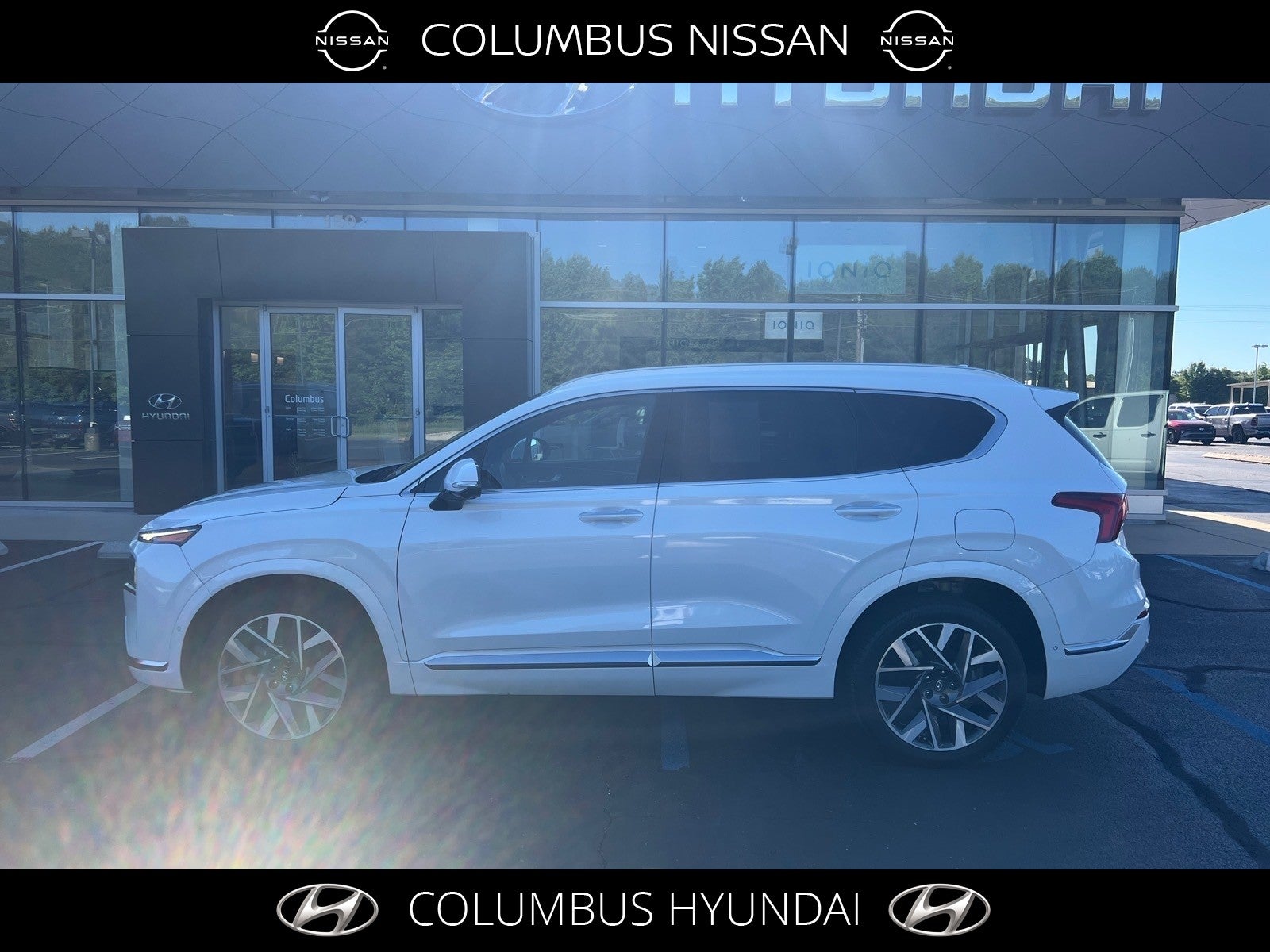 2023 Hyundai SANTA FE Calligraphy in White — front three-quarter view