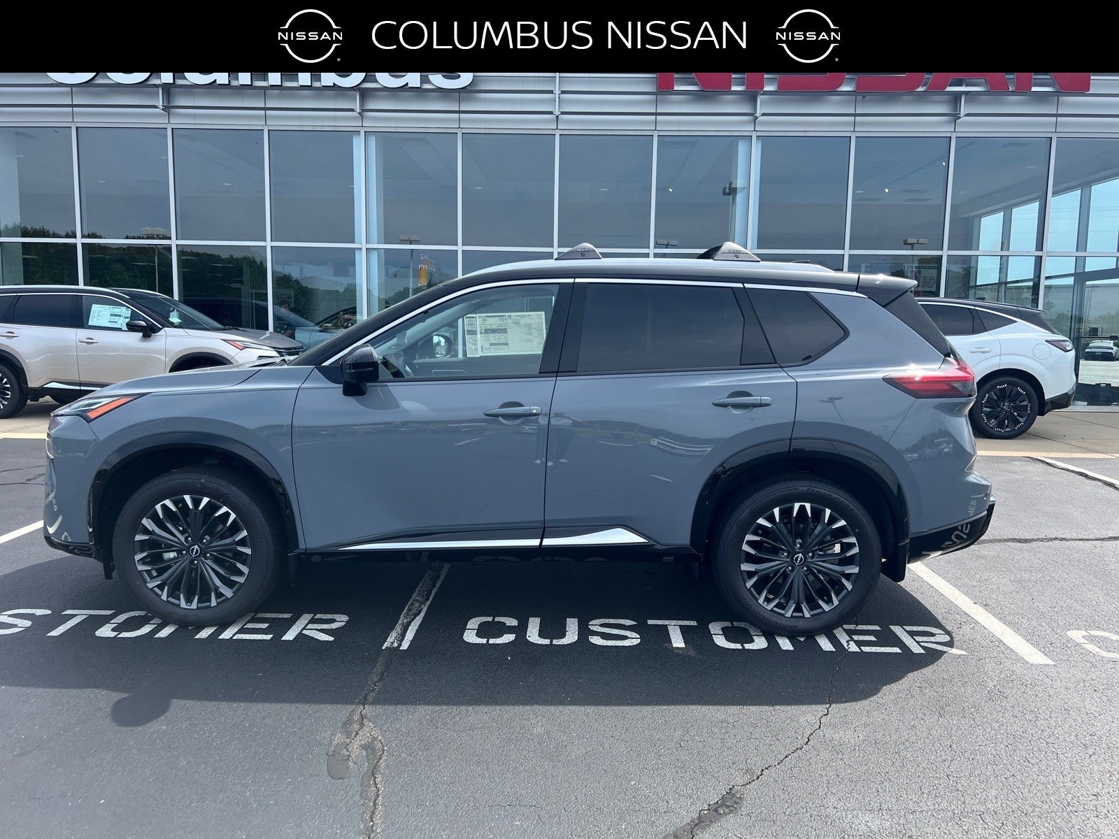 2026 Nissan Rogue Platinum in Gray — front three-quarter view